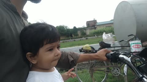 6 months old enjoying bike ride