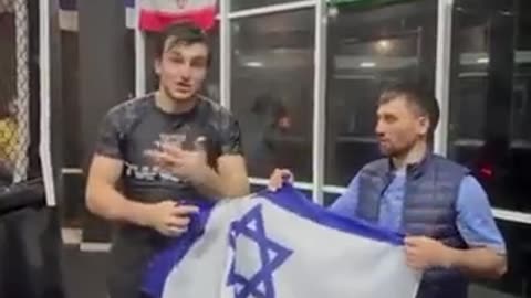 Chechen MMA fighters destroy an Israeli flag in a gym