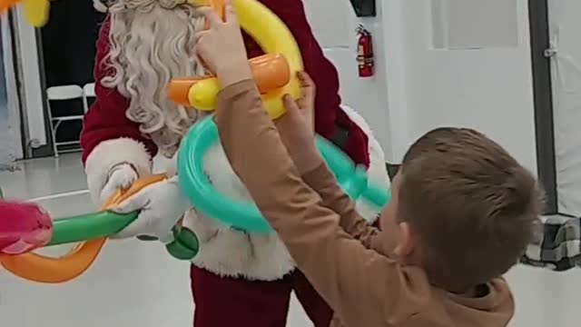 Even Santa wasn't too old to play with our Balloon Head Catching