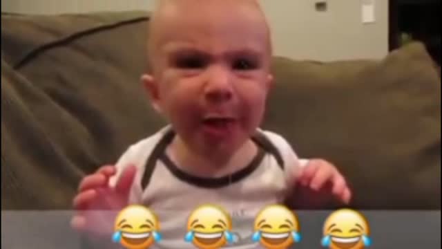 cute baby expression when eating sour fruit