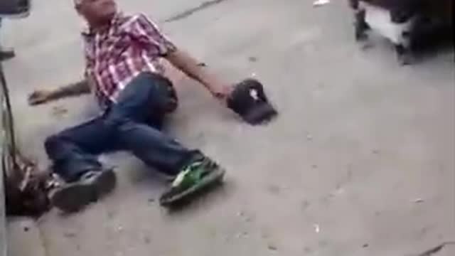 Old man got scared from his sit and fell flat on the floor