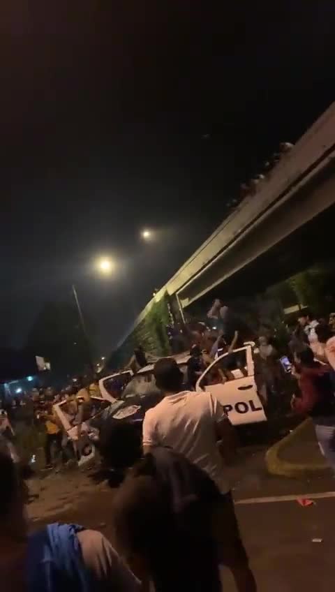 Panamanian Protestors Parade Police Car During Riots Over Food And Gas Prices