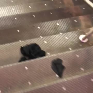 Clothes on floor down stairs mta subway