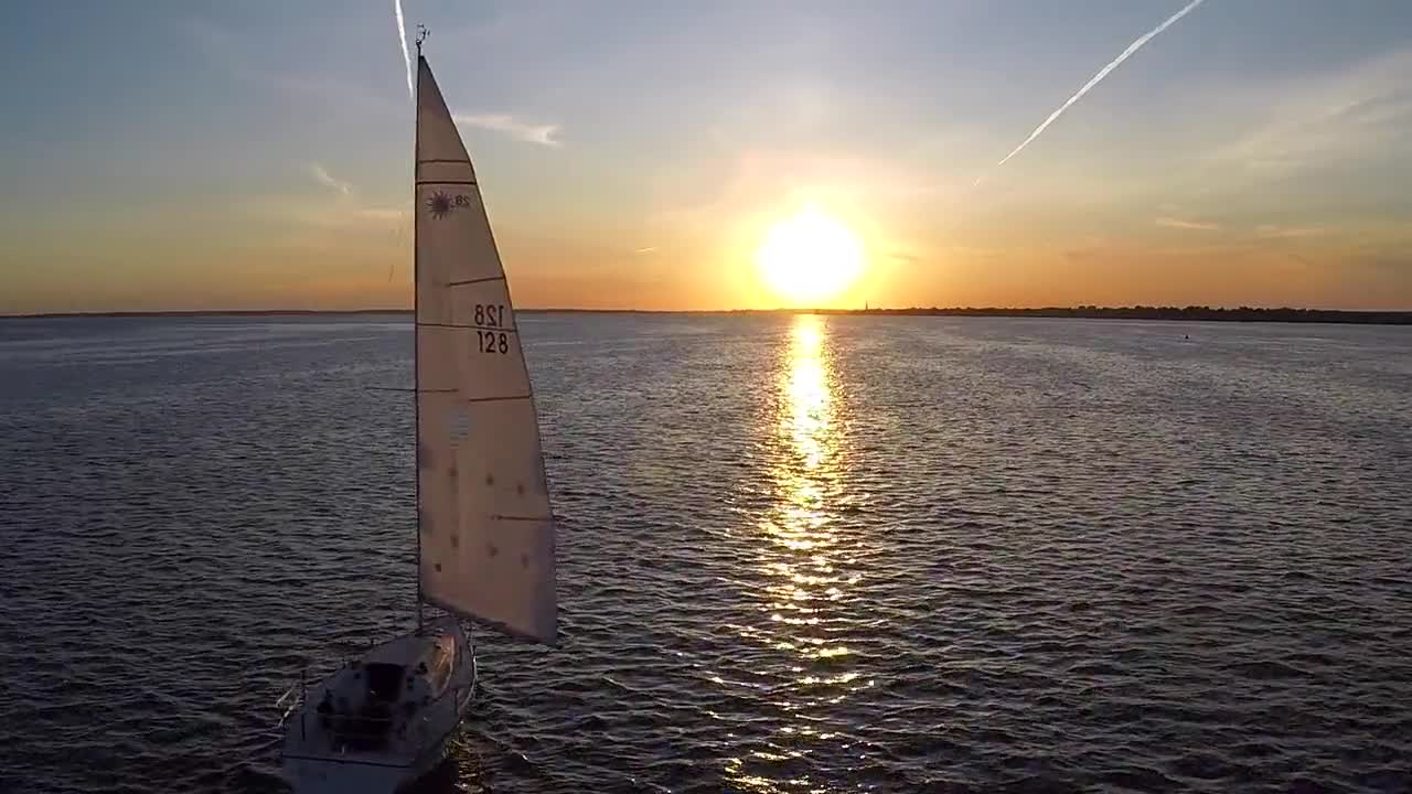 Sailboat sailing during sunset