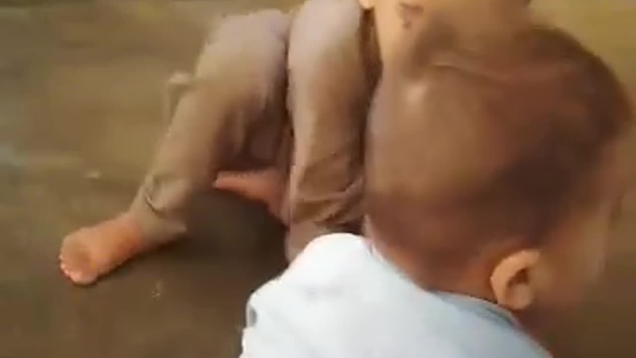 Cute Baby playing with Chick