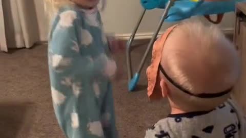 The little boy startled his sister