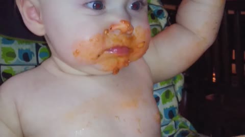 Baby girl makes gigantic mess of her lasagna