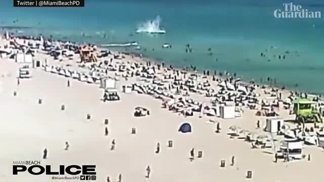 Helicopter crashes into ocean at crowded Miami Beach, injuring two