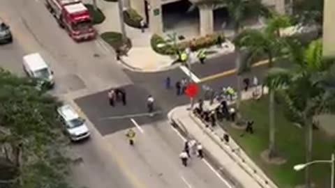 CRANE ACCIDENT, FT LAUDERDALE. SHE WALKED AWAY UNHARMED.