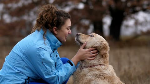 Labrador licks his owner