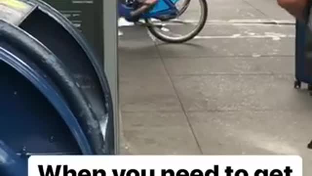Old guy green bike back pedaling street