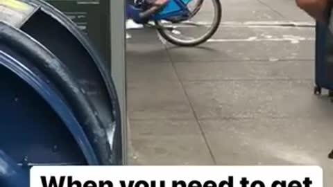 Old guy green bike back pedaling street