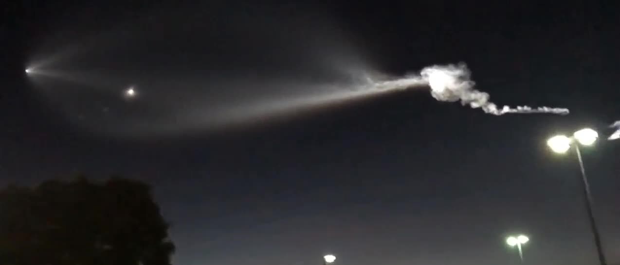 Rocket Launch Causes Glowing Plume in Night Sky