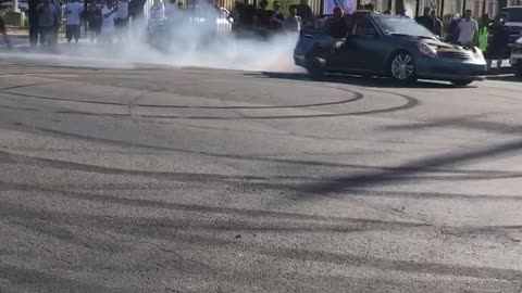 Charger Hits Curb While Spinning Donuts in the Street