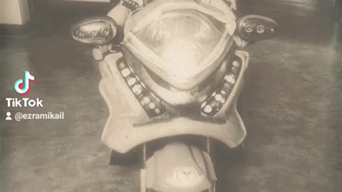 Very Cute Boy Riding a motorcycle