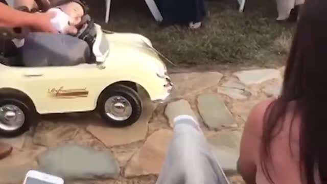 Baby turns wedding ceremony into super fun laughs - rings fall off