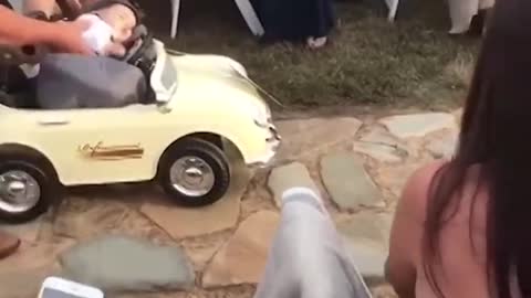 Baby turns wedding ceremony into super fun laughs - rings fall off