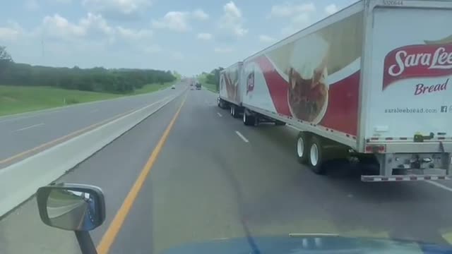 You want to see the toll booth, the 53-foot double container and the