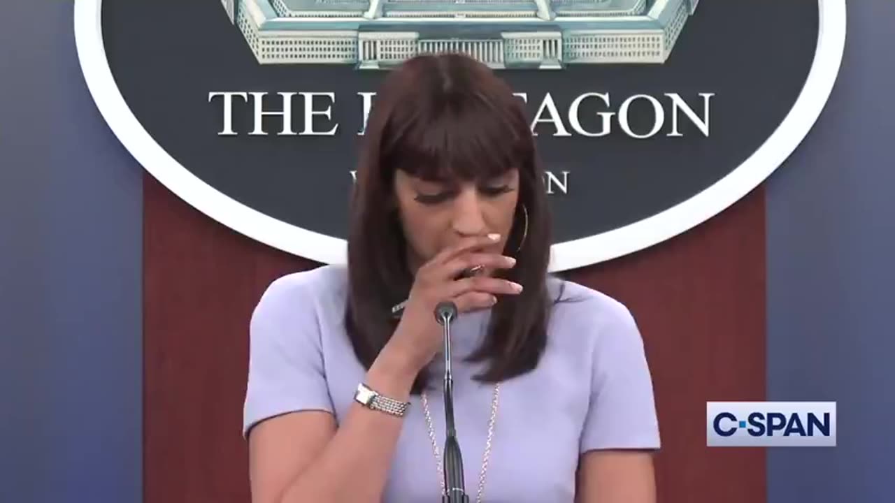 THAT IS A TRANNY. WHO JUST SNORTED SOME COKE. AT THE PENTAGON. HOLDING A PRESS CONFERENCE.