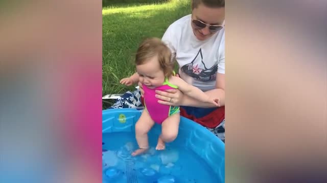 Funny Baby Playing With Water