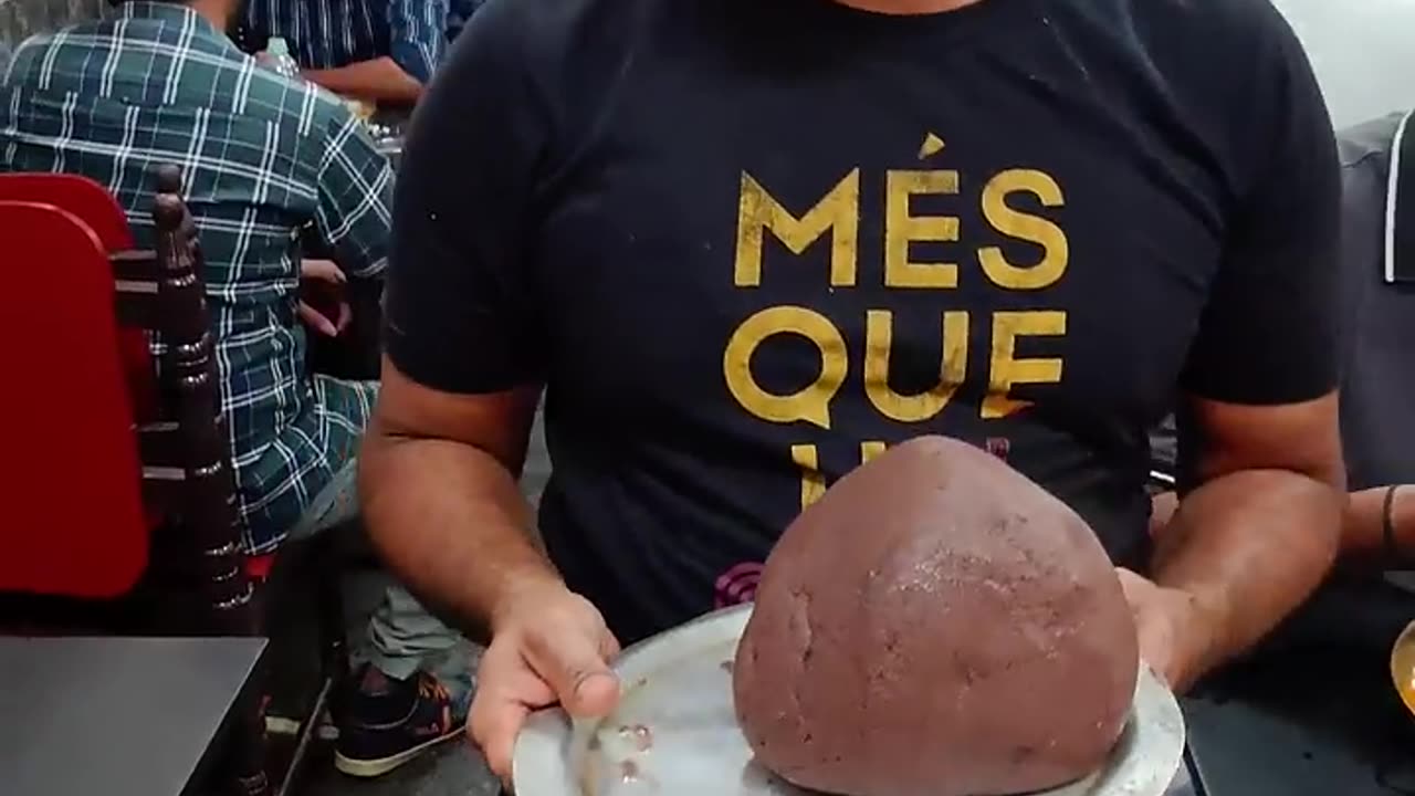 This is how this man serves dancing ragi mudde in a unique style #shorts #ragimudde #streetfood