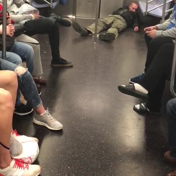 Man in green pants passed out on subway train