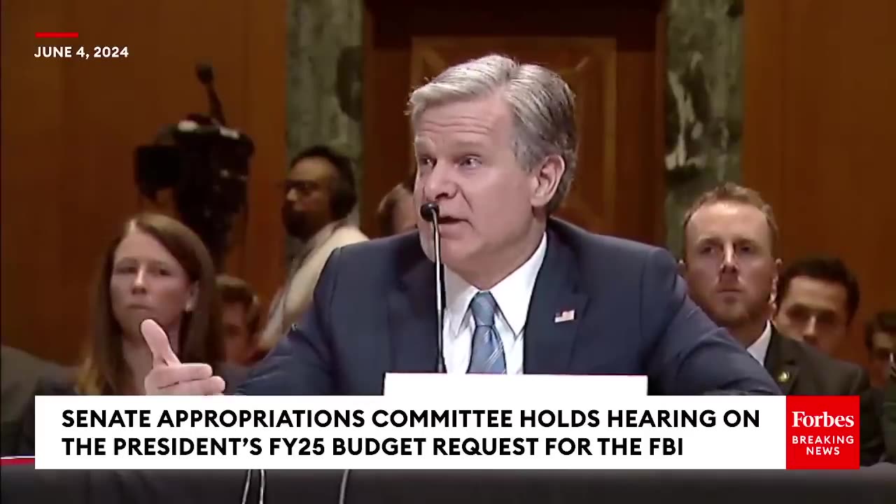 FBI's Wray Asked If Trump's Trials Are 'Coordinated Election Interference' Or 'Just A Coincidence'