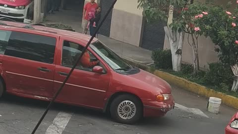 Woman Smashes Car with Pipe after Accident