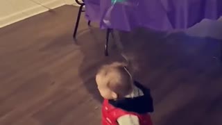 Mom Hack Tying Balloon to Toddlers Hair