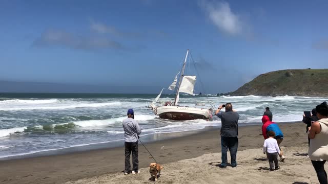 Tugging a Sailboat Off the Shore