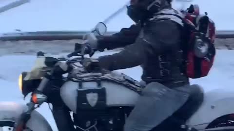 Dedicated Motorcyclist Rides during Snow Storm