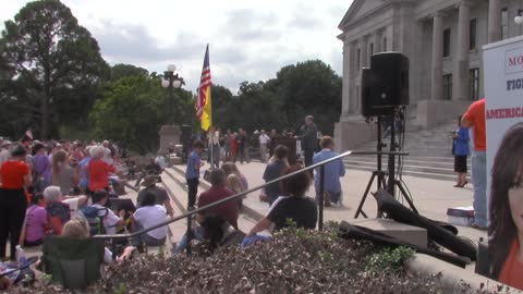 Doc Washburn talking about losing his job at Arkansas Rally against Vaccine Mandates 1