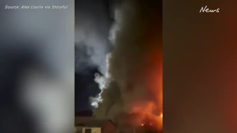 Kyiv building engulfed in flames after deadly Russian airstrike