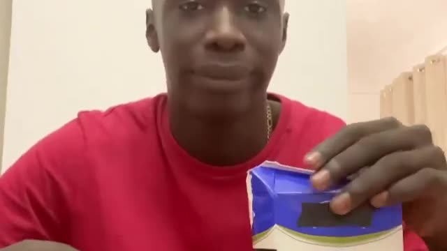 Khaby lame taught how to cut milk packet properly