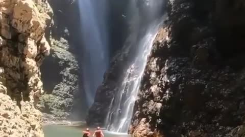 Do they dare to go below such a high waterfall?