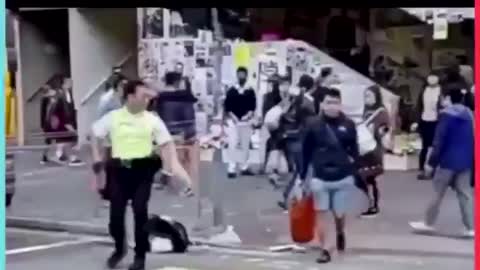 Hong Kong police gun shot unarmed protestor