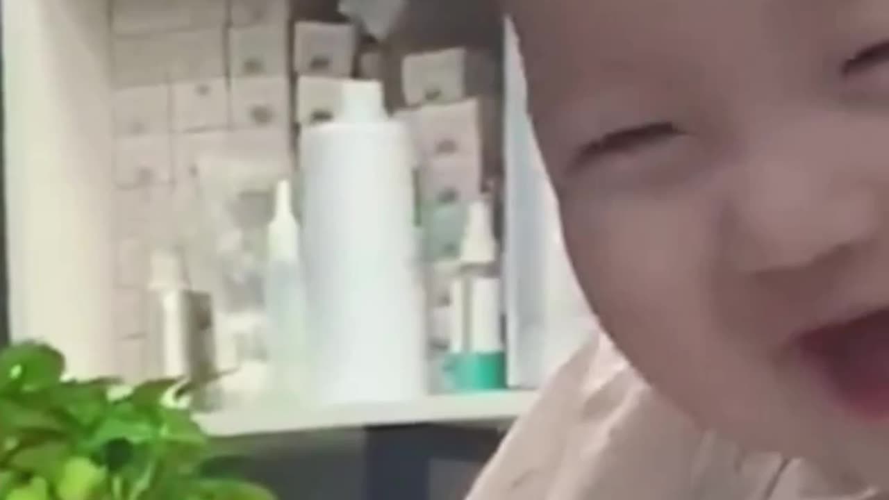 Cute baby smiling while cutting hair.Watch Till End & Enjoy.