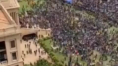 Protesters storm the presidential palace in Sri Lanka's capital.