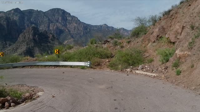 Motorcycling into the depths of the Canyon in Mexico.