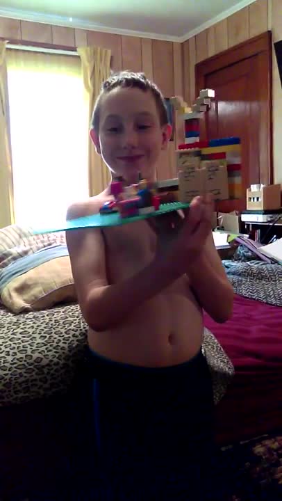 Noah showing his lego construction