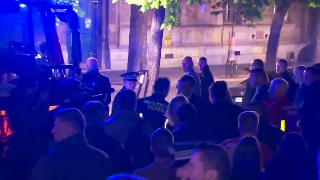 Macron gets 1st look at damage