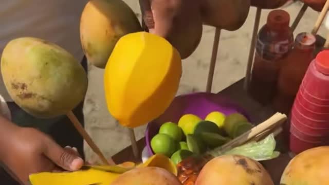 Fresh mangoes on the beach in
