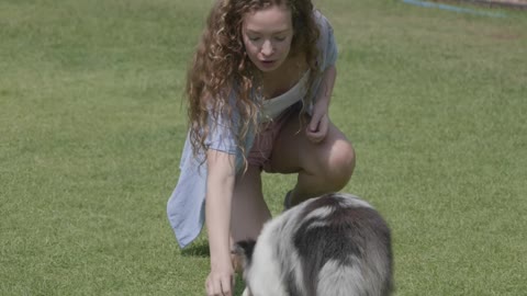 woman-training-her-dog