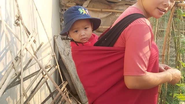 Nephew and mother visit the garden