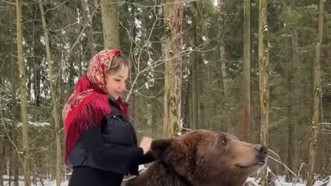 Girl with huge Bear.