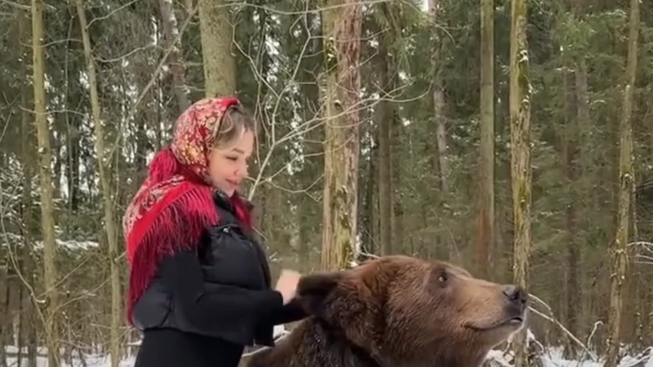 Girl with huge Bear.