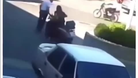 chick runs over a dude twice on a scooter.