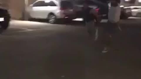 Guy in black shirt running and falls down