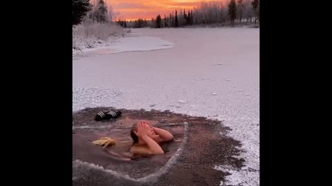 BATH UNDER THE ICE LAYER WATER