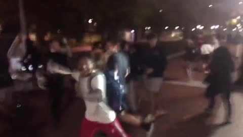 Police on horseback are called in during a riot at Penn State